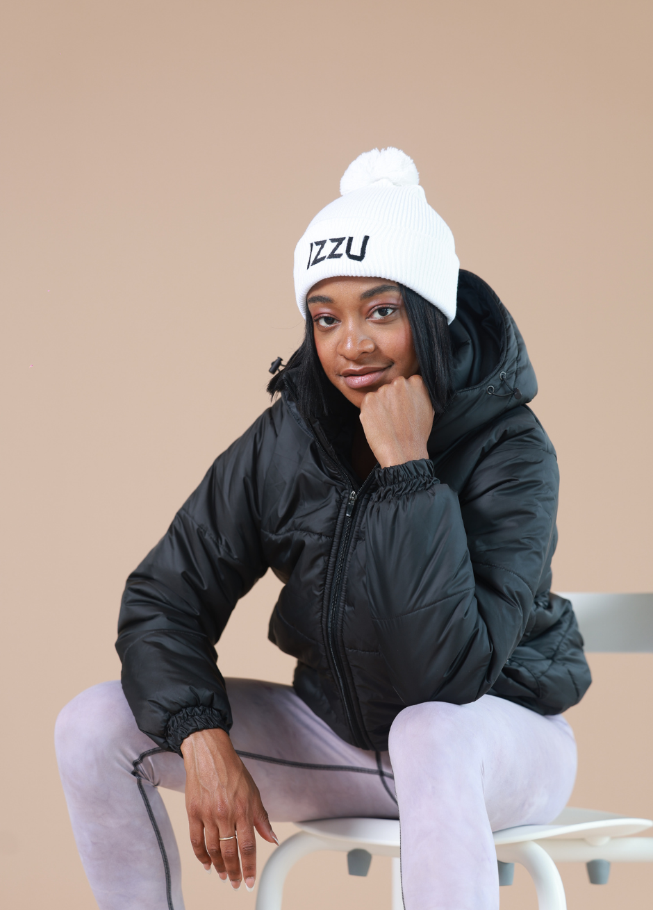 White wool cap | Black Puffer Jacket